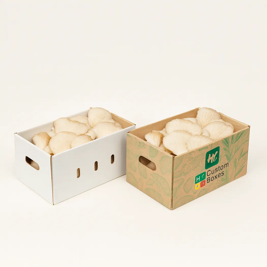 Two cardboard mushroom trays with side handles- one white and one featuring green leaf motifs- class=